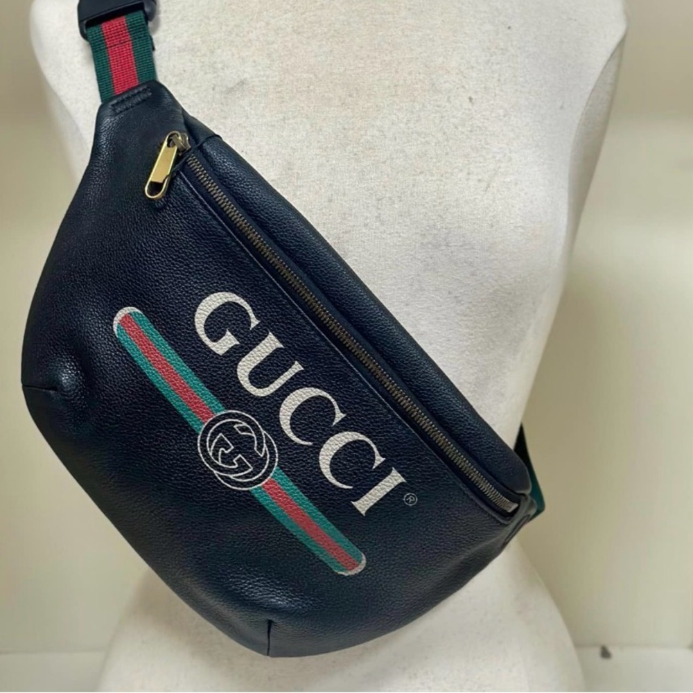 Authentic Gucci logo black waist/bum bag with Gucci dust bag. COA pictured.